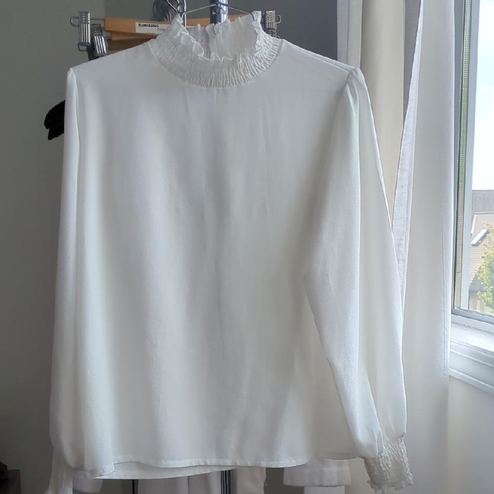 Elegant White Ruffled Blouse
